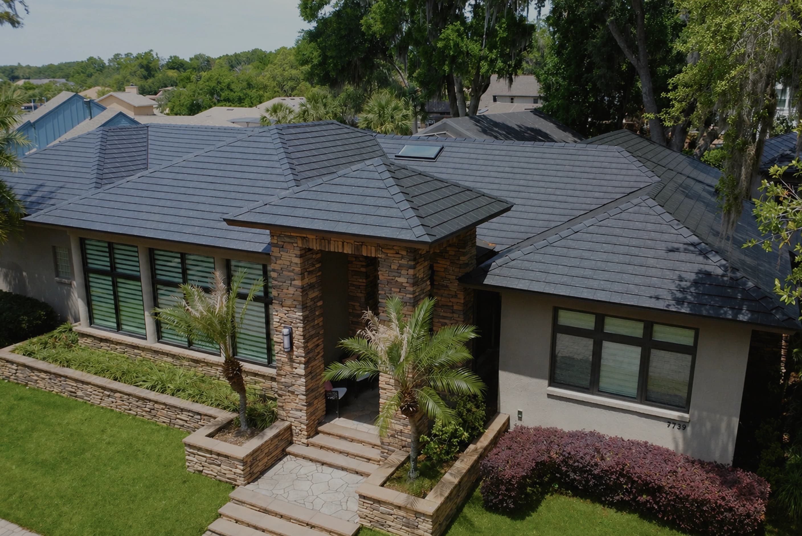 Metlok pressed-steel shingle roof on a premium Florida home