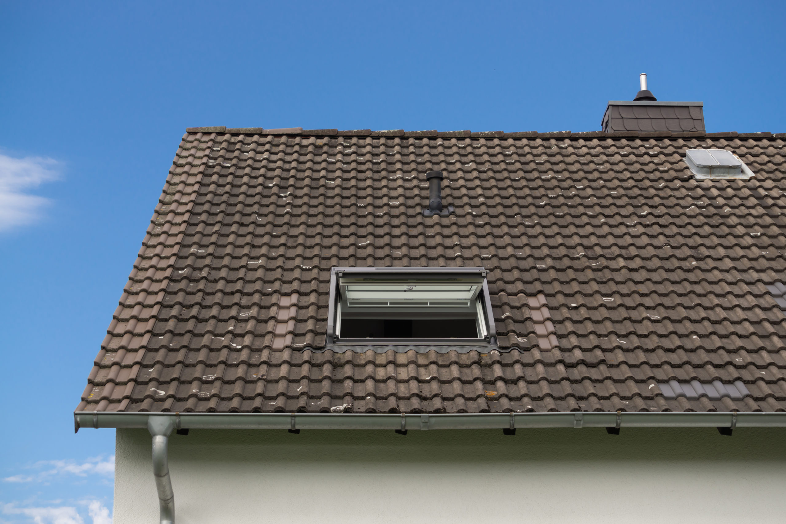 An image of a slowly degrading shingled roof
