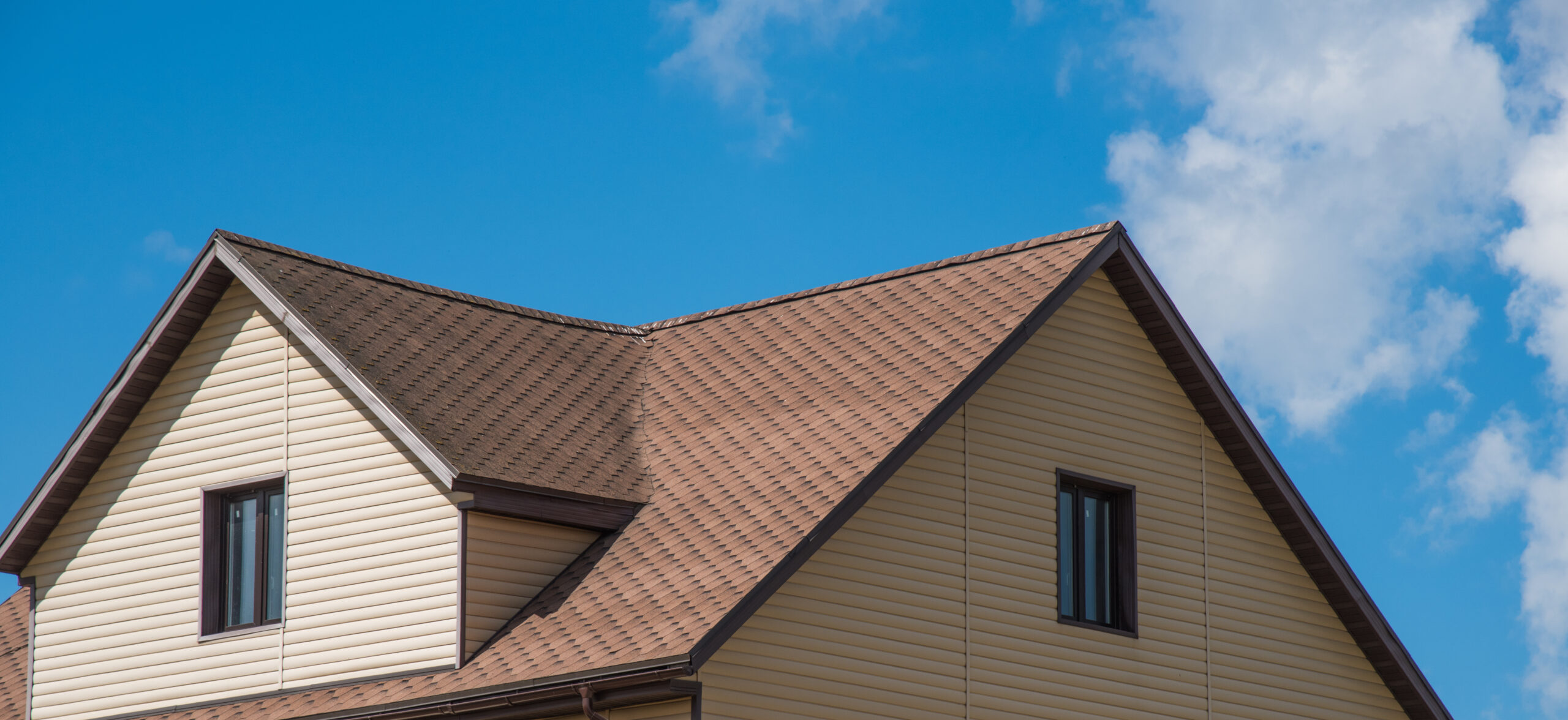Close up of a roof on a brown house