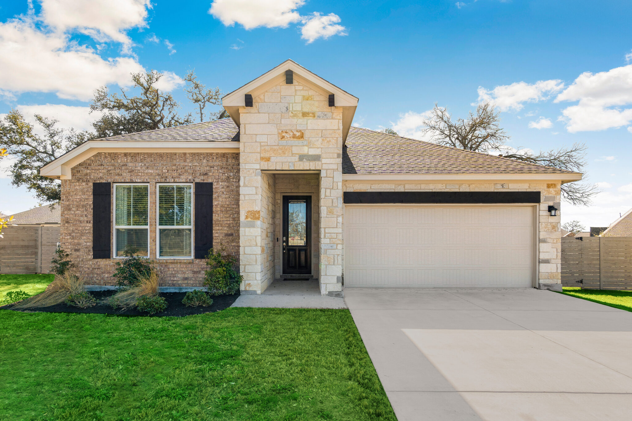Yellow stucco house with tile roof