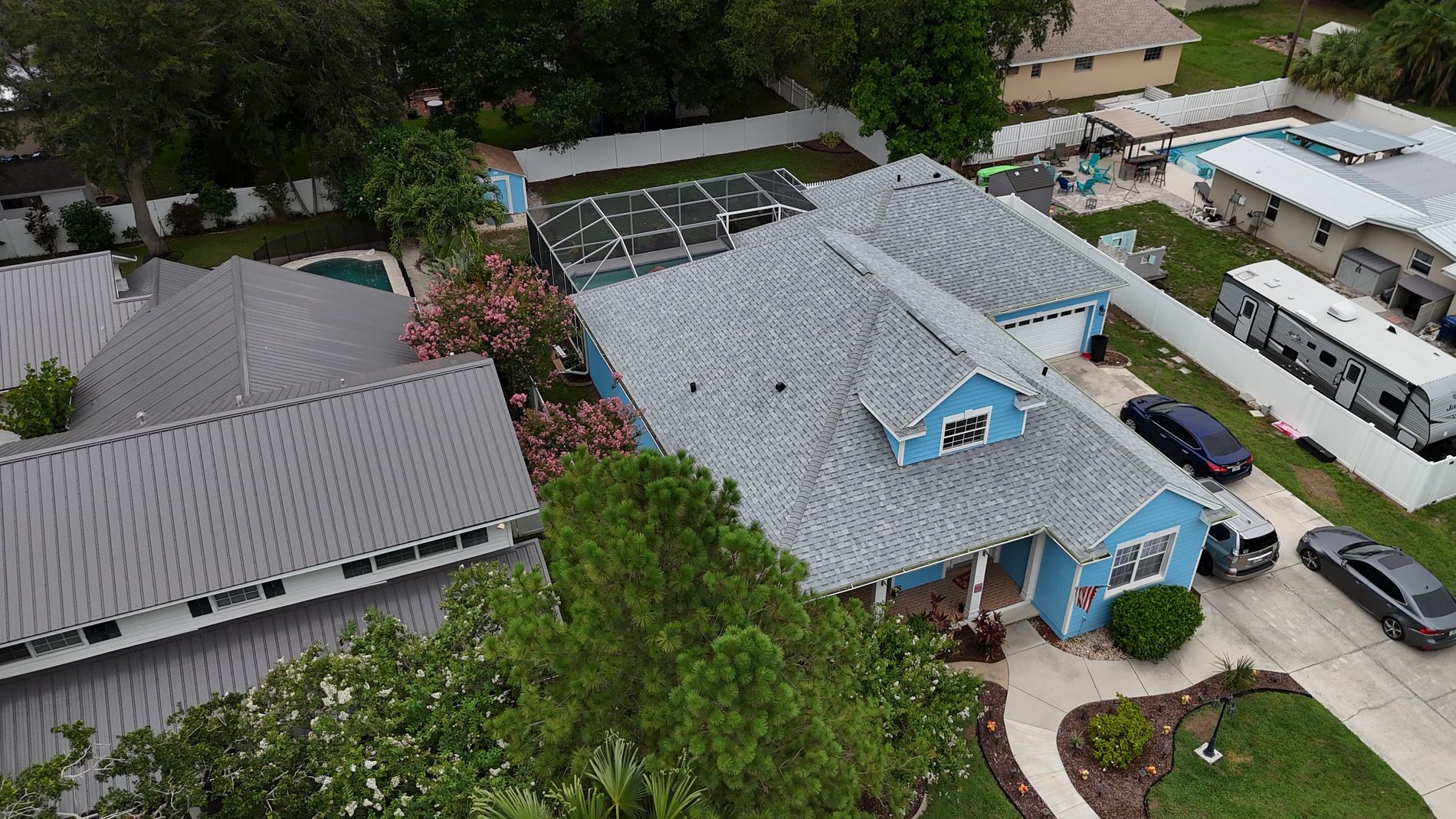 Aerial view of large commercial property with multiple homes and buildings on it