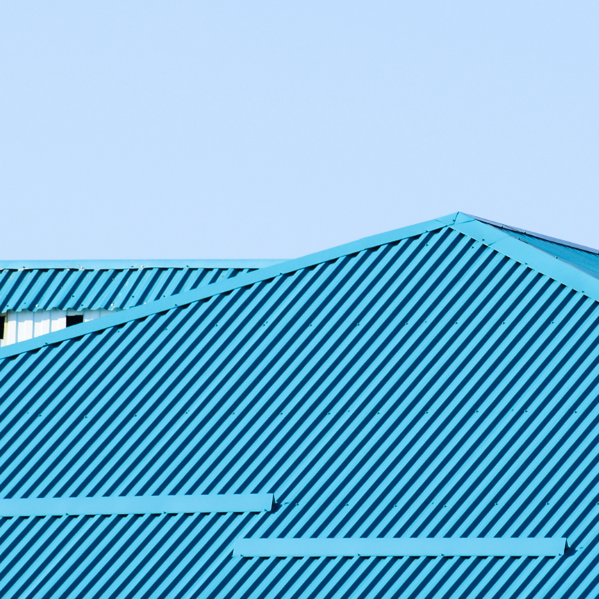 Close-up image of bright blue roofing